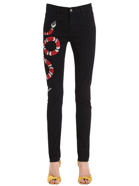 gucci jeans girls|Gucci snake embroidered jeans.